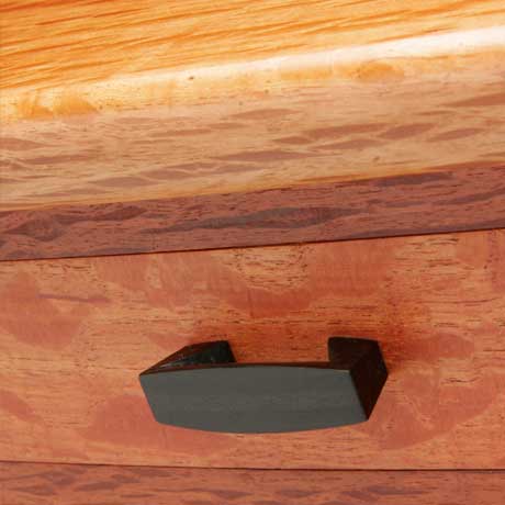Detail of The Dancer hall table in she oak, wenge and ebony