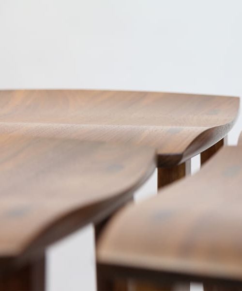 Detail of Wave Bar Stools in Blackwood.