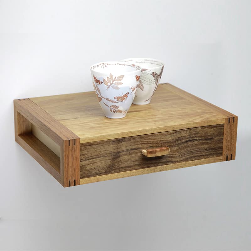 Wall hung drawer in blackwood, rock maple and sheoak.