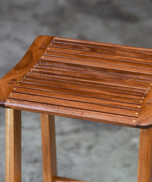 A bar stool designed for Australian breakfast bars made from native timbers.