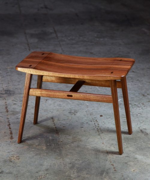 A low stool designed for Australian houses made from native timbers.