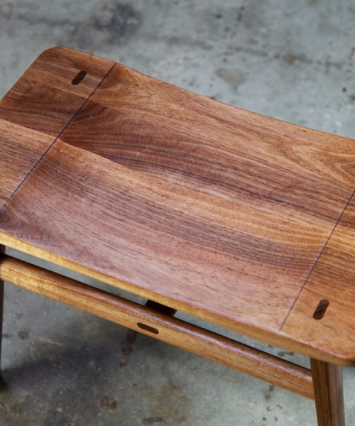 A low stool designed for Australian houses made from native timbers.