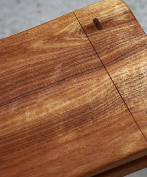 A low stool designed for Australian houses made from native timbers.