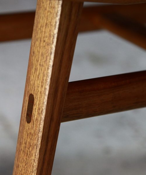 A low stool designed for Australian houses made from native timbers.
