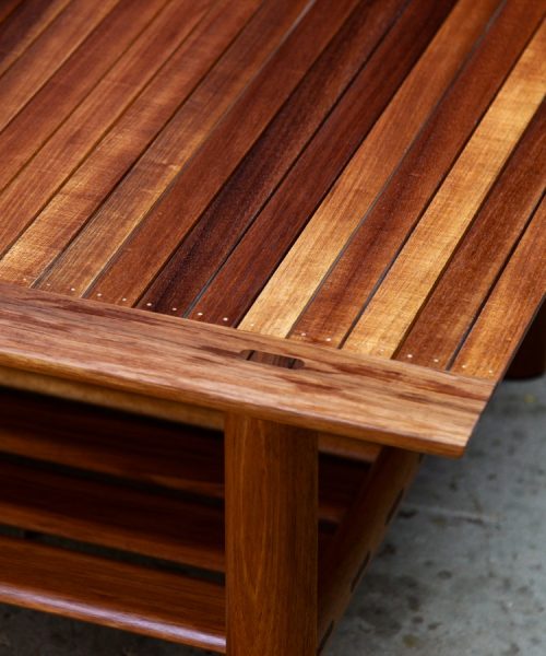 A coffee table with magazine shelf designed for Australian homes and crafted from native timbers.