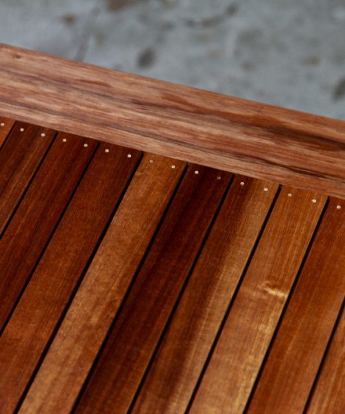 A coffee table with magazine shelf designed for Australian homes and crafted from native timbers.