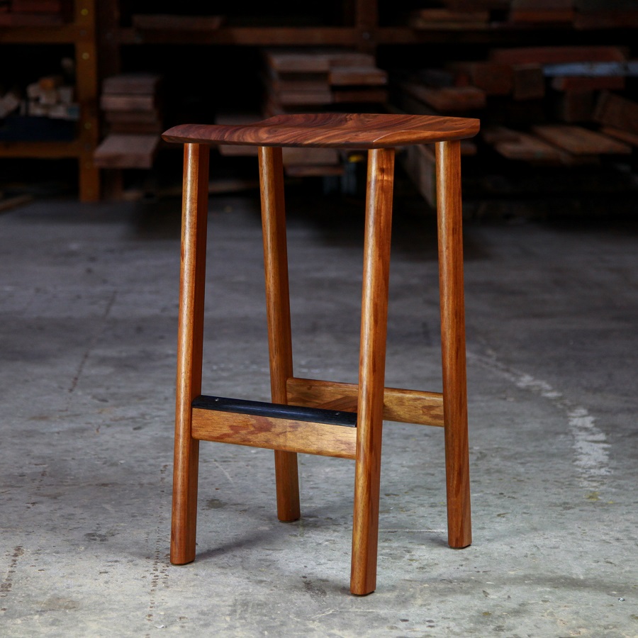 A bar stool designed for Australian breakfast bars made from native timbers.