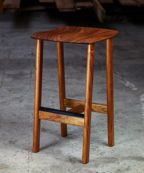 A bar stool designed for Australian breakfast bars made from native timbers.