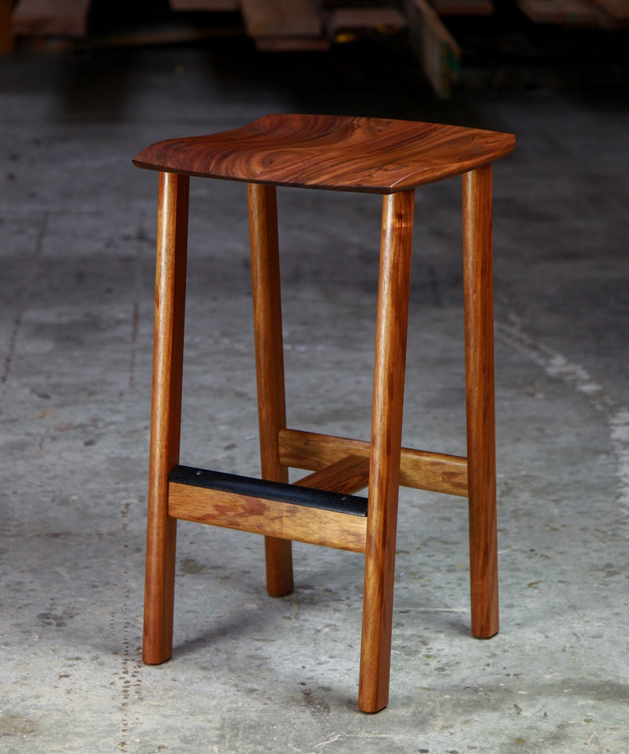 A bar stool designed for Australian breakfast bars made from native timbers.