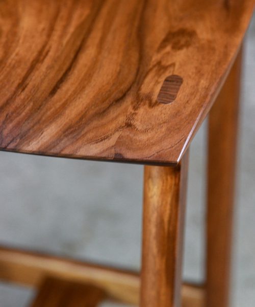 A bar stool designed for Australian breakfast bars made from native timbers.