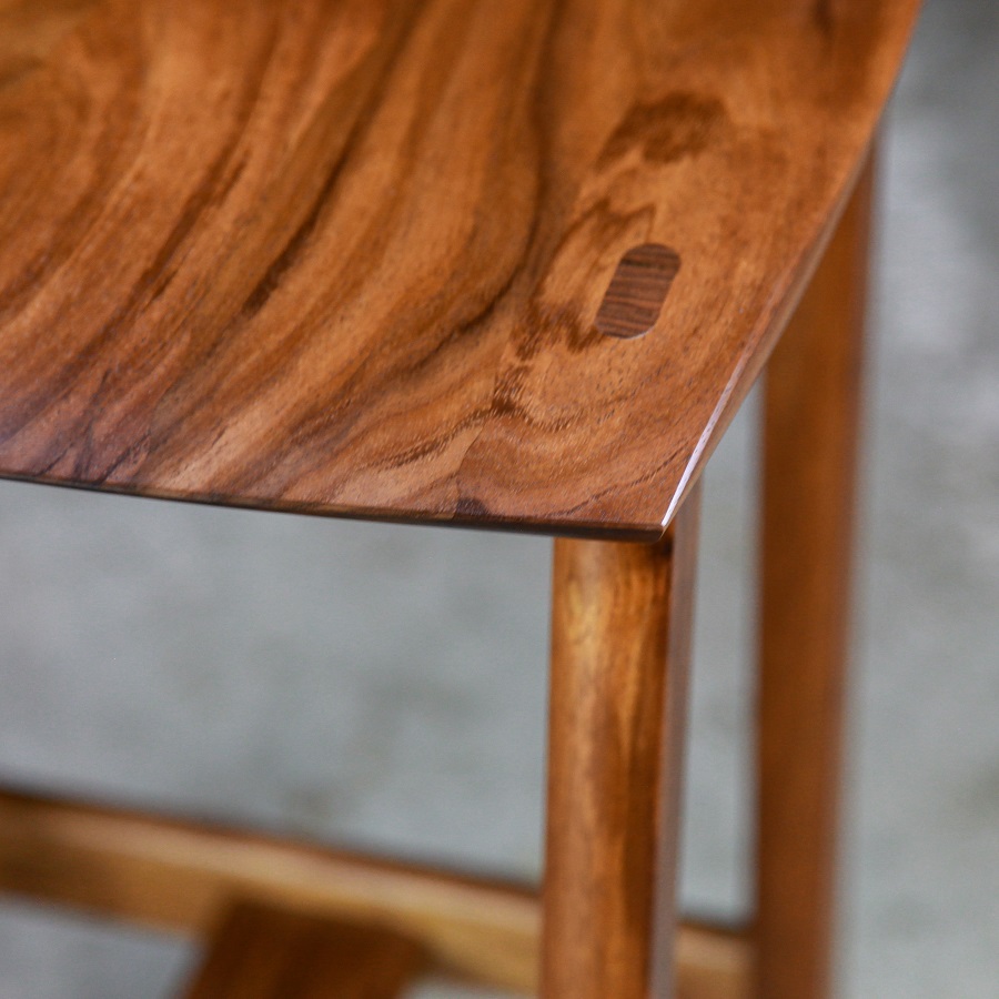 A bar stool designed for Australian breakfast bars made from native timbers.