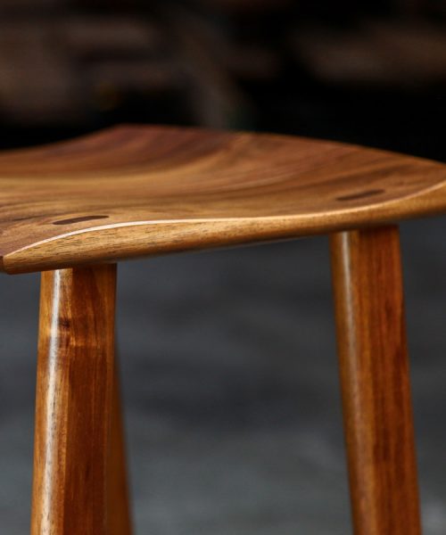 A bar stool designed for Australian breakfast bars made from native timbers.