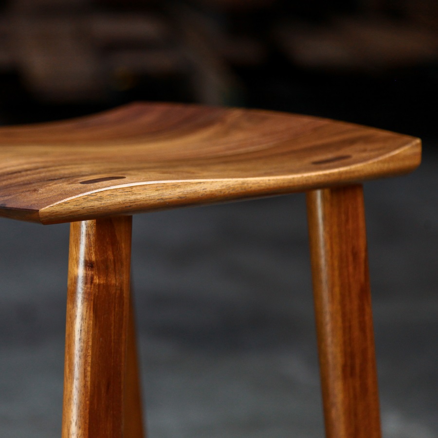 A bar stool designed for Australian breakfast bars made from native timbers.