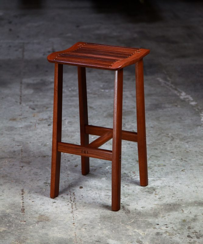 A bar stool designed for Australian breakfast bars made from native timbers.