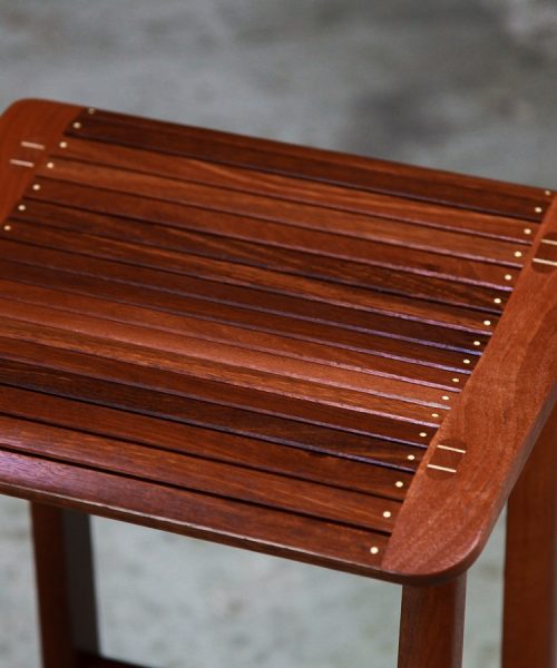 A bar stool designed for Australian breakfast bars made from native timbers.
