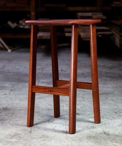 A bar stool designed for Australian breakfast bars made from native timbers.