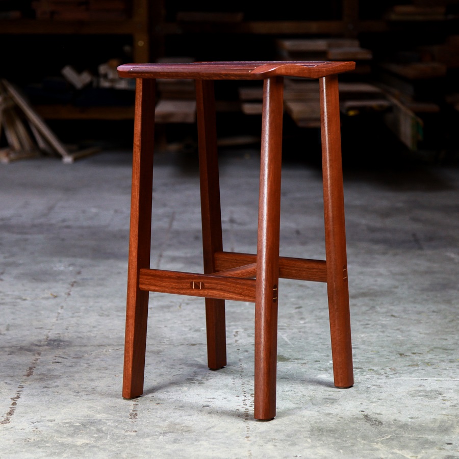 A bar stool designed for Australian breakfast bars made from native timbers.