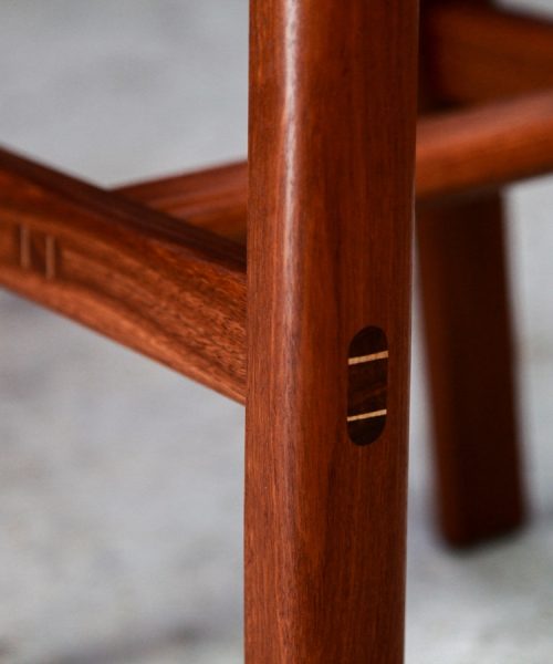 A bar stool designed for Australian breakfast bars made from native timbers.