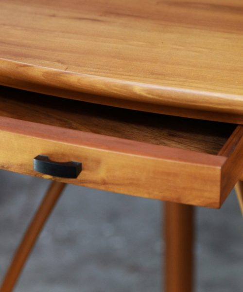 A corner table designed for Australian homes made from native timbers.