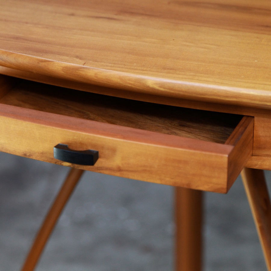 A corner table designed for Australian homes made from native timbers.