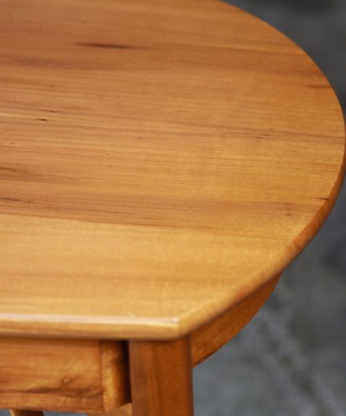 A corner table designed for Australian homes made from native timbers.