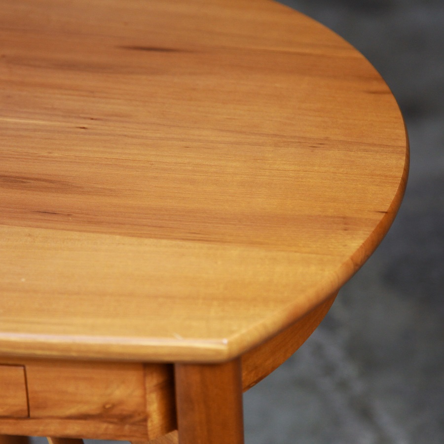A corner table designed for Australian homes made from native timbers.