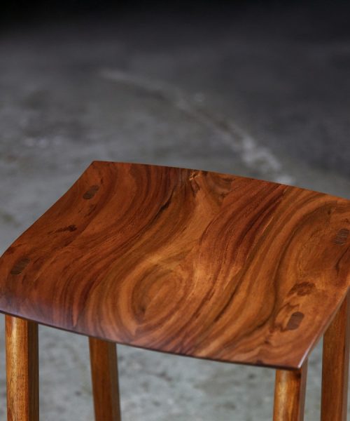A bar stool designed for Australian breakfast bars made from native timbers.