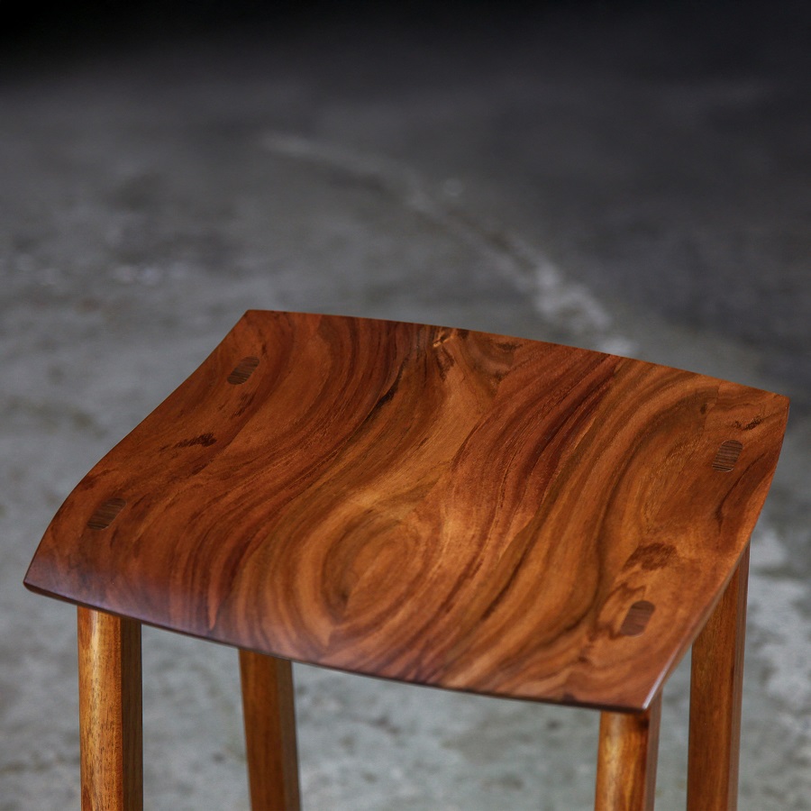 A bar stool designed for Australian breakfast bars made from native timbers.