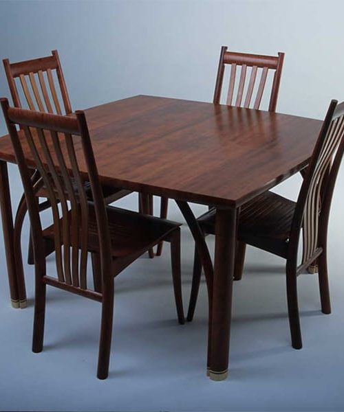 Confluence 4 seat dining table in red gum with silver ash and Clearwater chairs