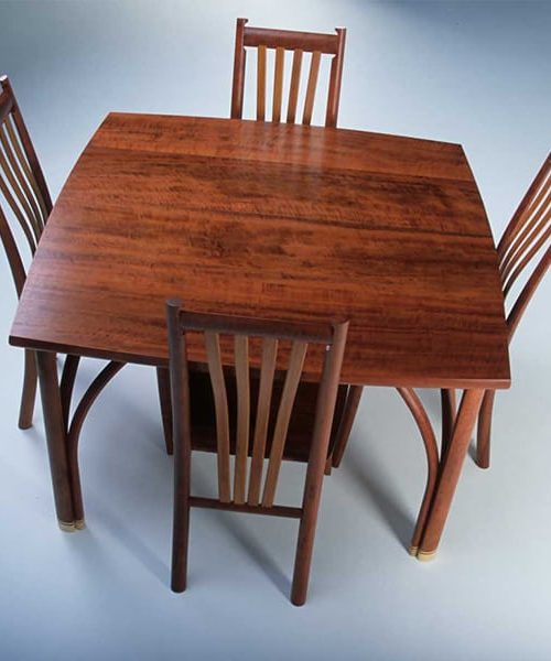 Confluence 4 seat dining table in red gum with silver ash and Clearwater chairs