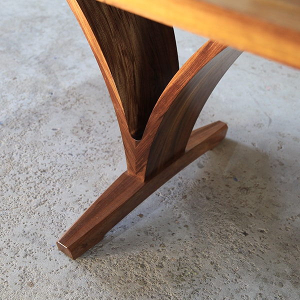 Contour dining table in blackwood